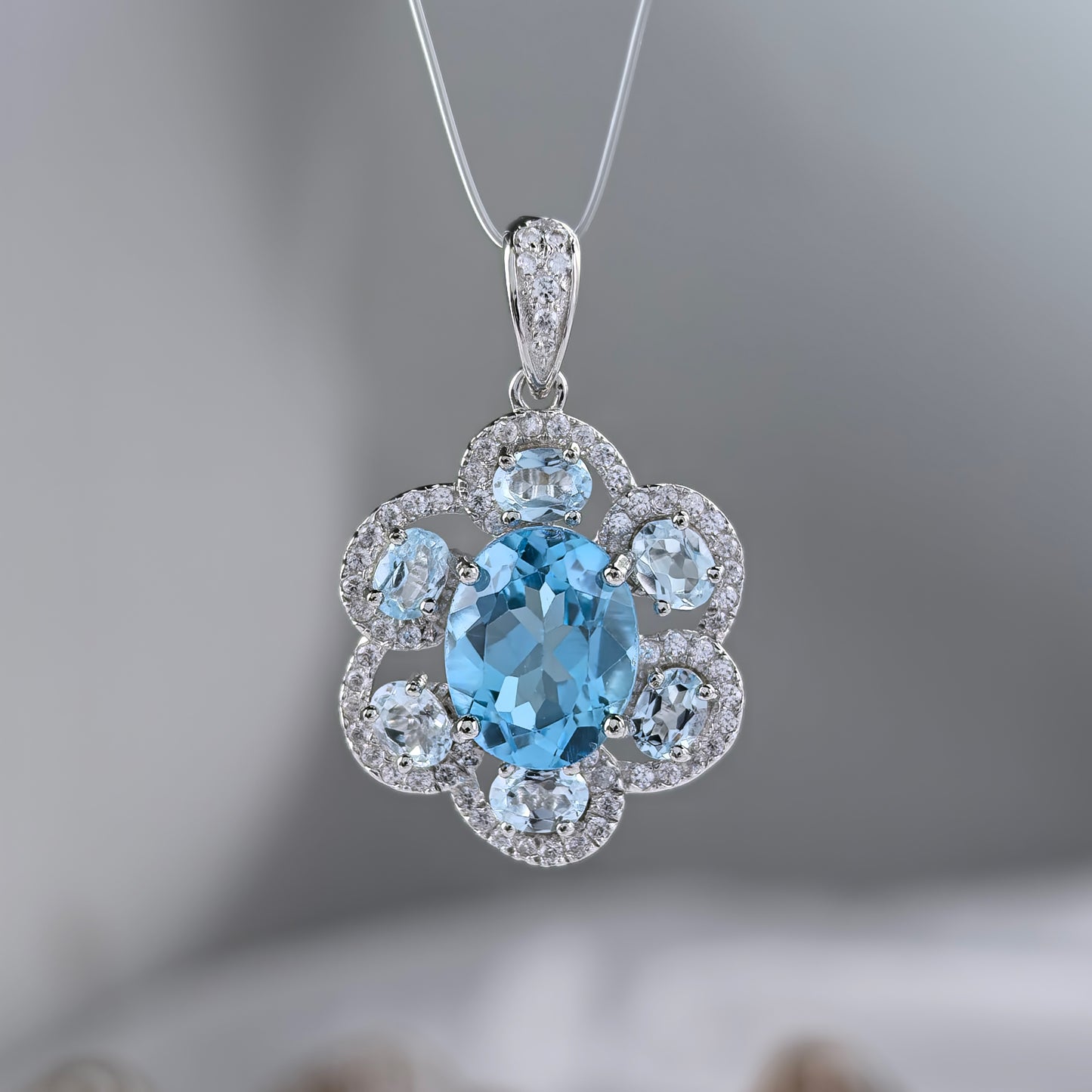 Elegant Rhodium Plated 925 Sterling Silver Natural Swiss Blue Topaz Flower Pendant