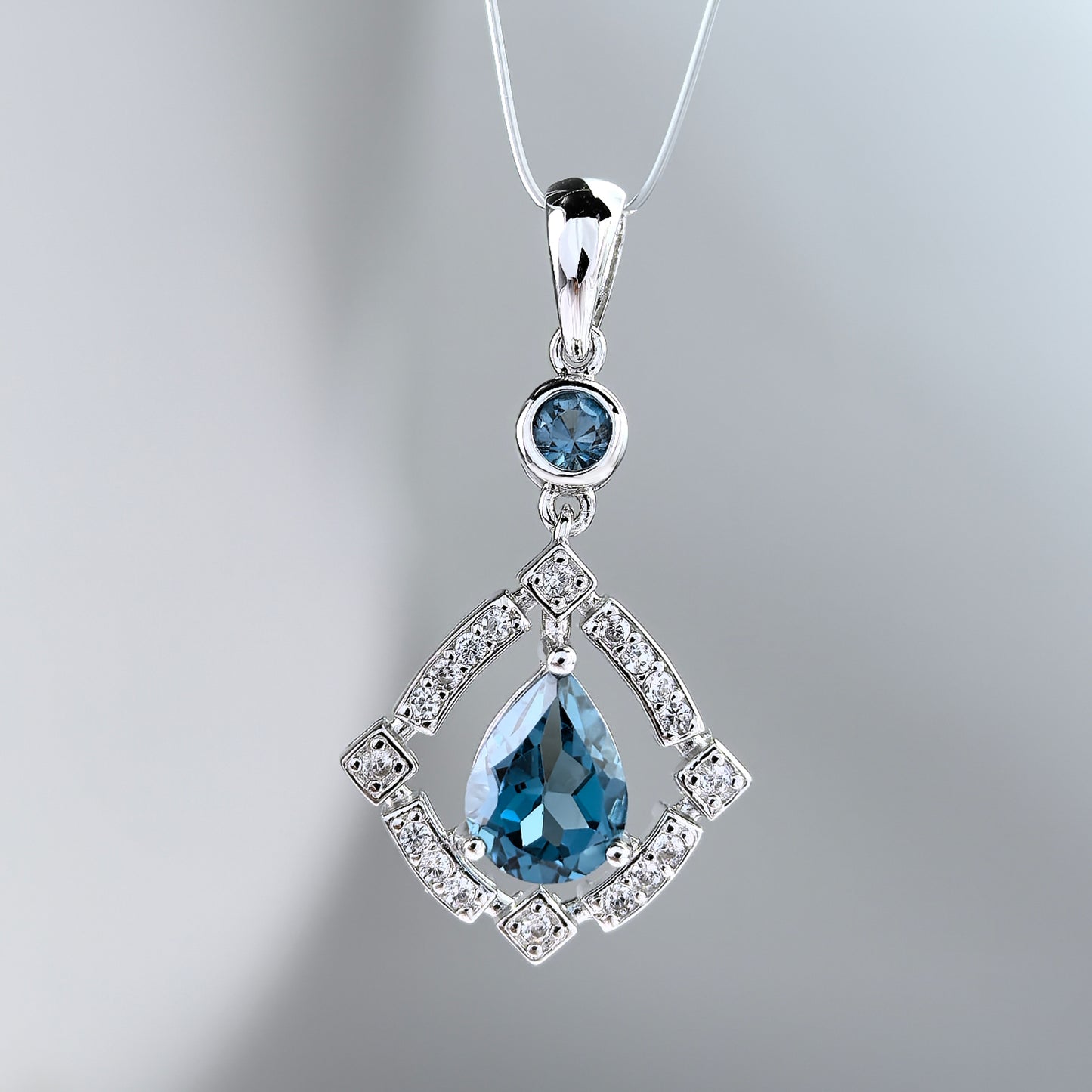 Elegant Rhodium Plated 925 Sterling Silver Natural London Blue Topaz Pendant