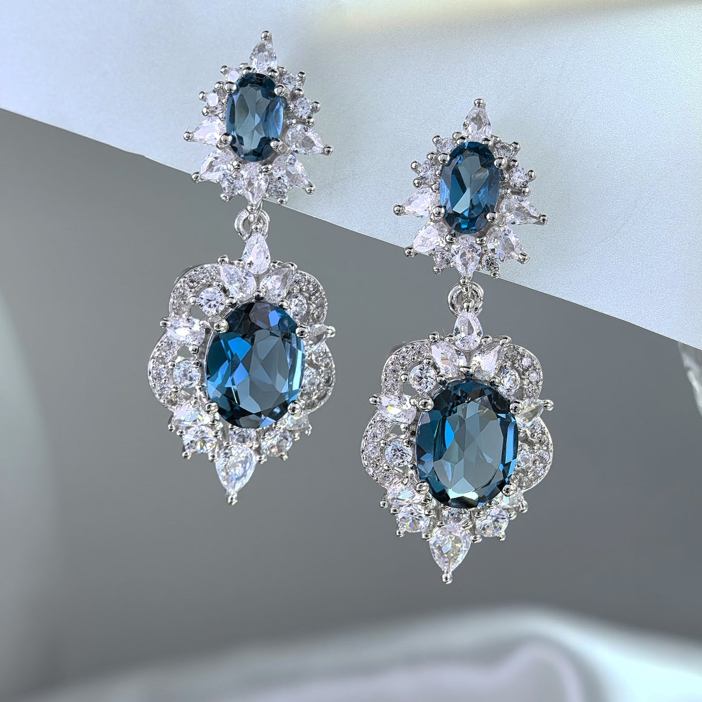 Elegant Rhodium Plated 925 Silver Oval Cut Natural London Blue Topaz Drop Earrings