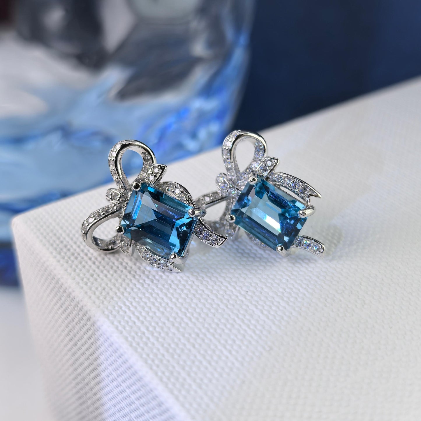 Elegant Rhodium Plated 925 Silver Jewelry Natural London Blue Topaz Bow Stud Earrings