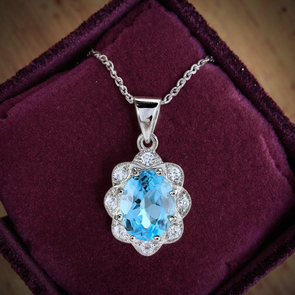 Sparkling Rhodium Plated Silver 925 Natural Swiss Blue Topaz Flower Pendant