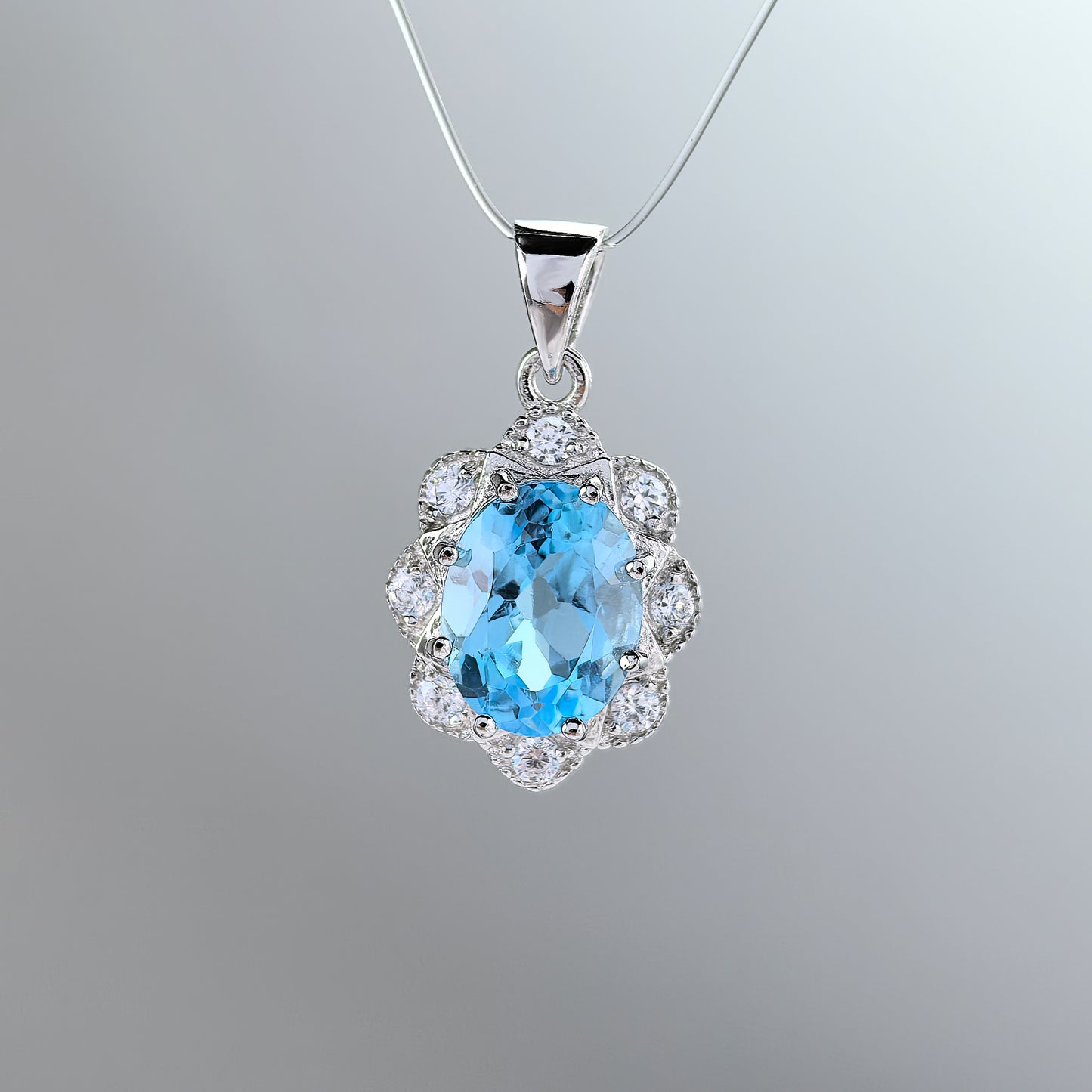 Sparkling Rhodium Plated Silver 925 Natural Swiss Blue Topaz Flower Pendant