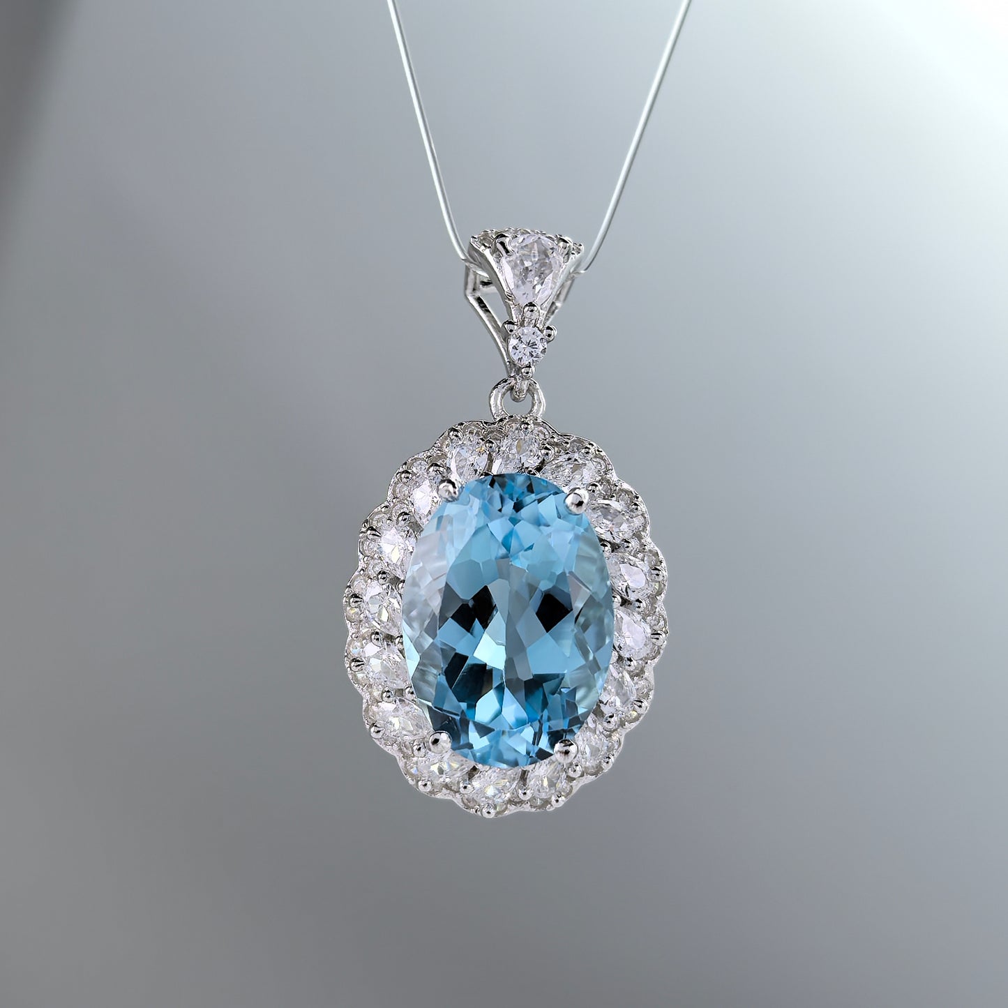 Elegant Rhodium Plated 925 Sterling Silver Natural Sky Blue Topaz Pendant