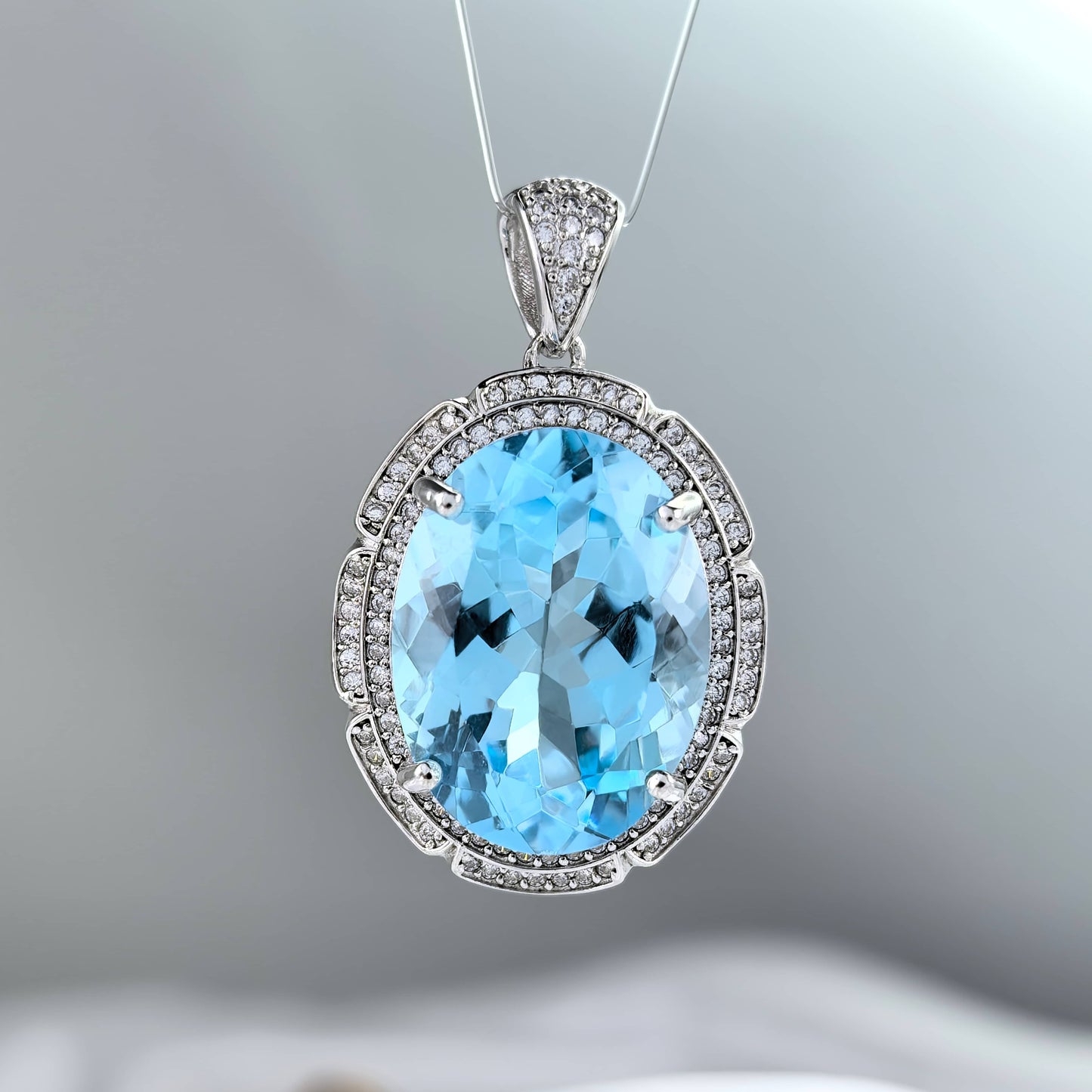 Dazzling Rhodium Plated 925 Silver Pendant with Natural Sky Blue Topaz