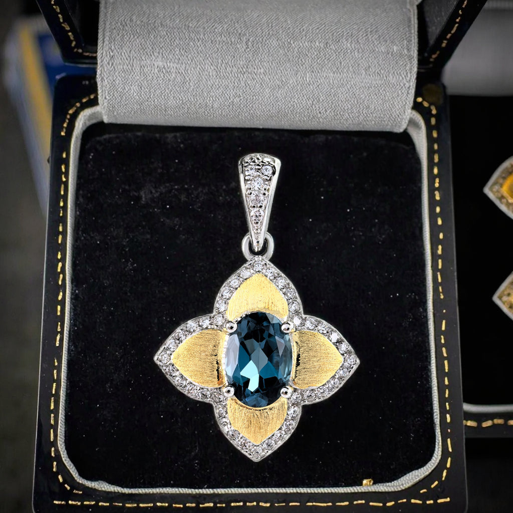 Elegant Rhodium and Gold Plated 925 Sterling Silver Natural London Blue Topaz Pendant