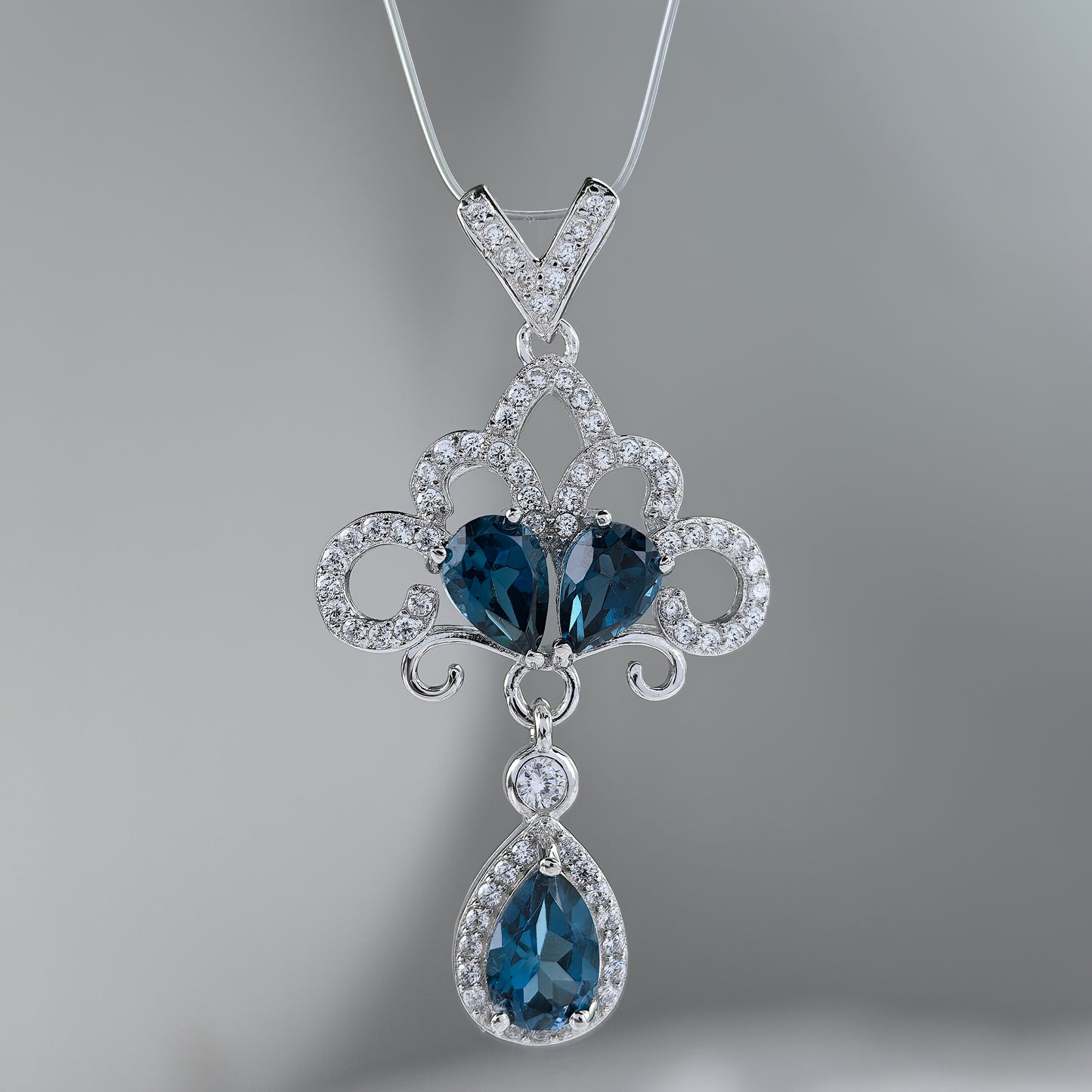 Elegant Rhodium Plated 925 Sterling Silver Natural London Blue Topaz Pendant