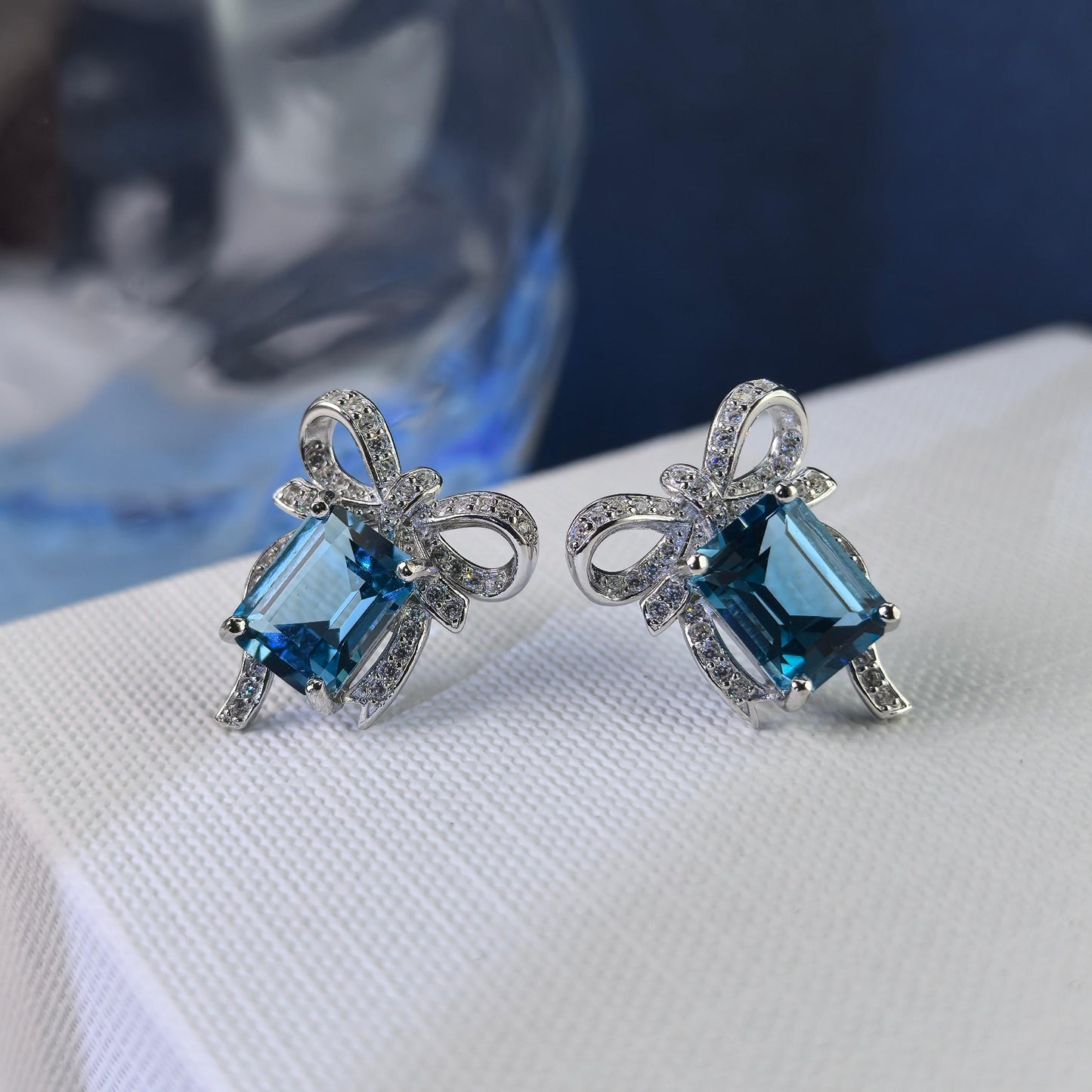 Elegant Rhodium Plated 925 Silver Jewelry Natural London Blue Topaz Bow Stud Earrings
