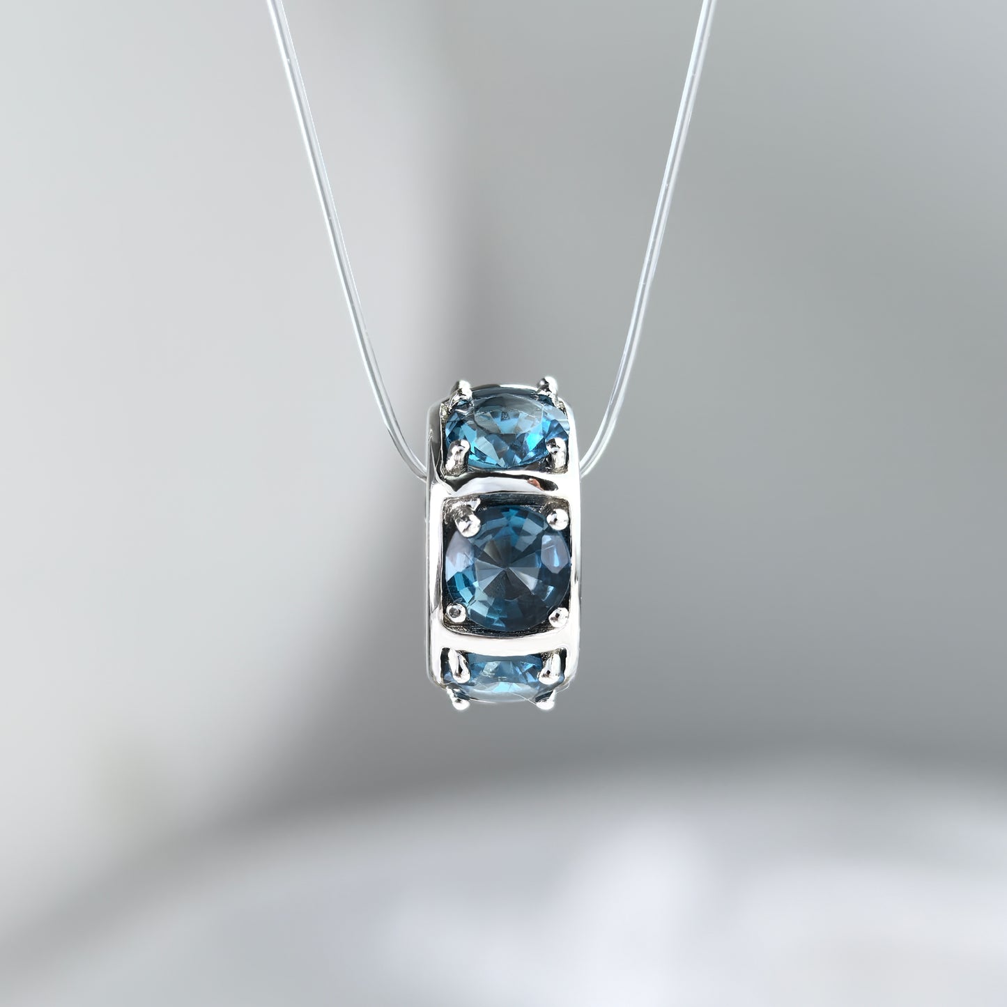 Delicate Rhodium Plated 925 Sterling Silver London Blue Topaz Pendant