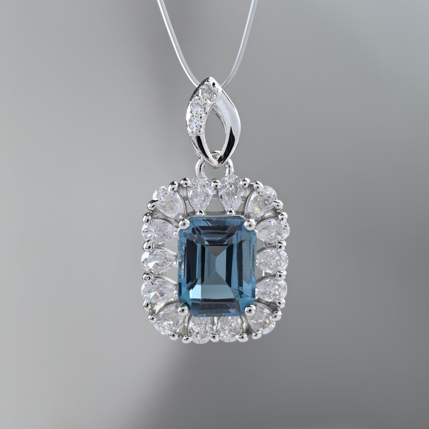 Dazzling Rhodium Plated 925 Sterling Silver Natural London Blue Topaz Pendant