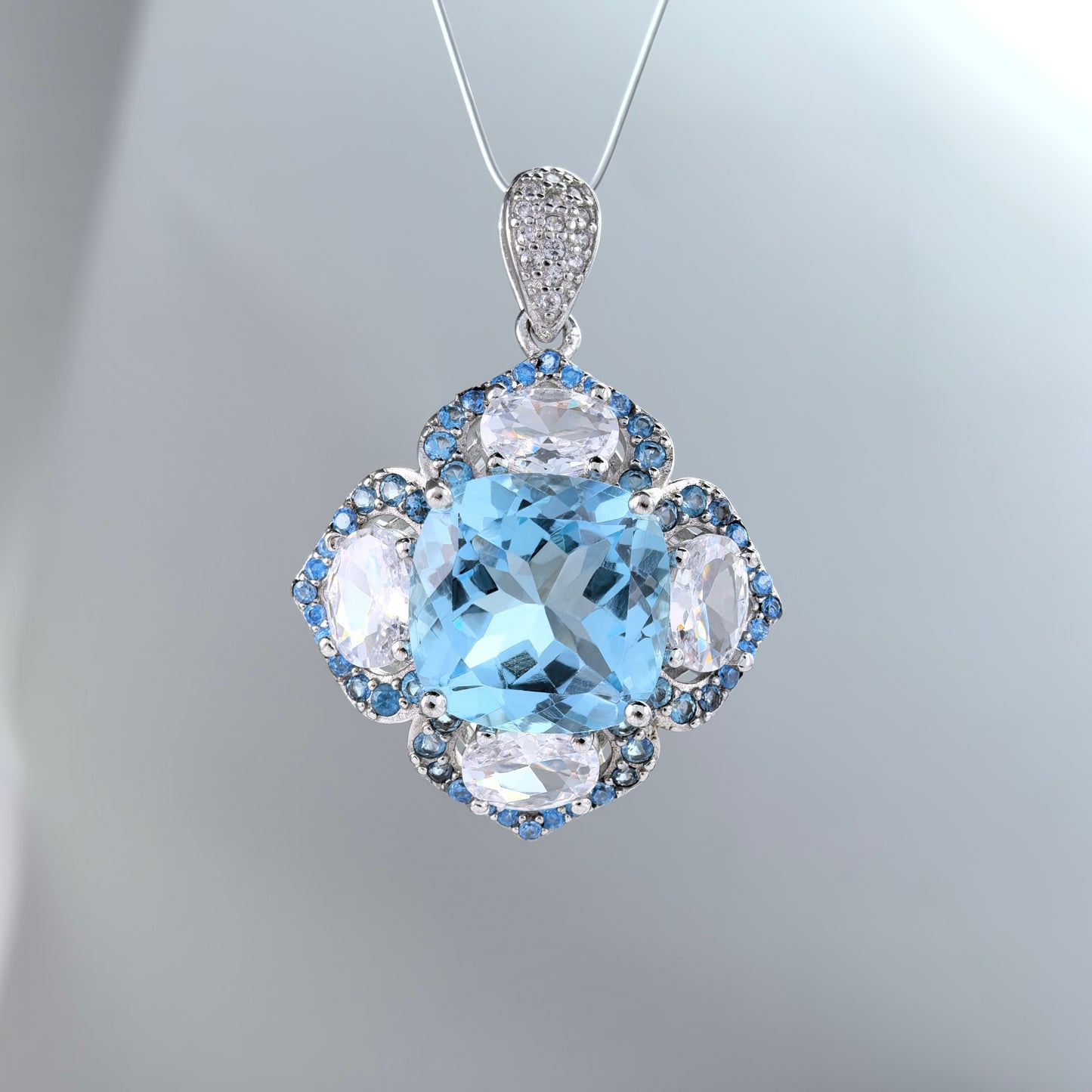 Graceful Rhodium Plated 925 Sterling Silver Natural Sky Blue Topaz Pendant