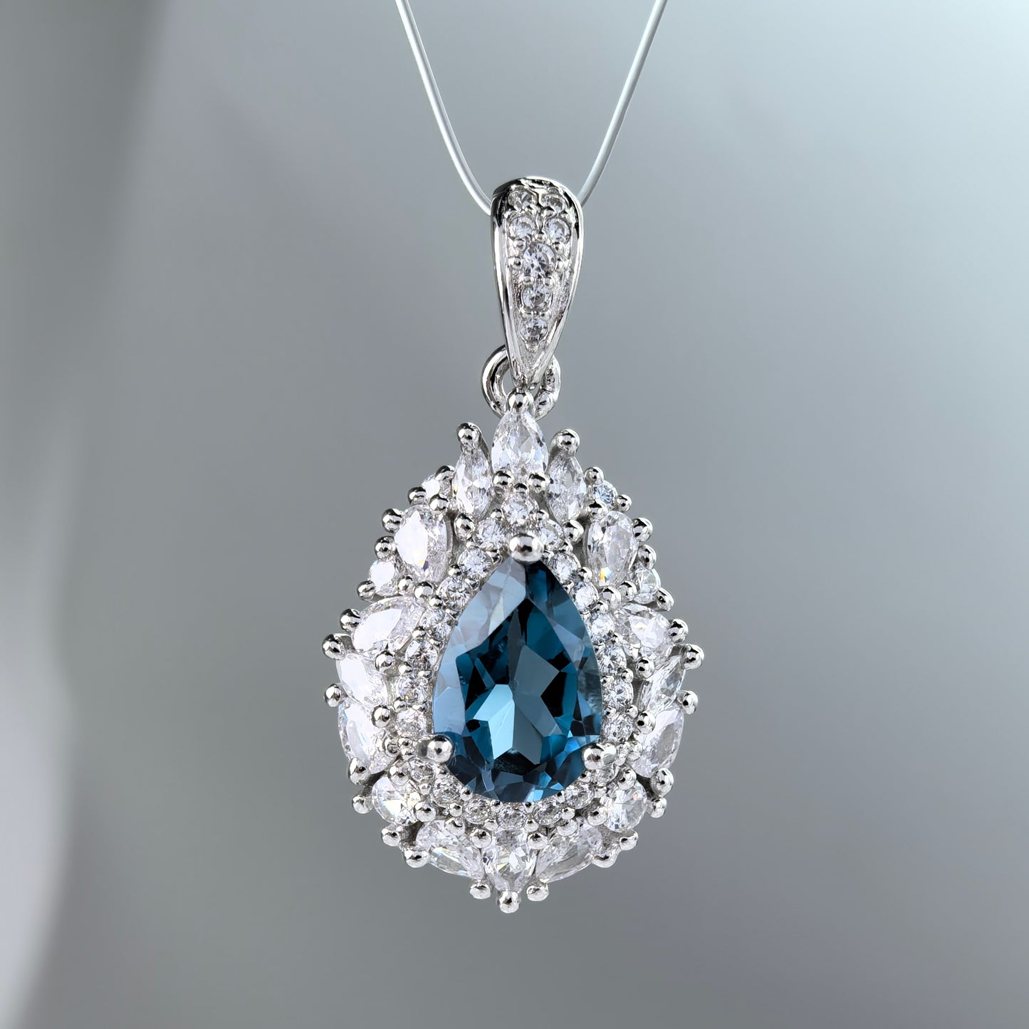 Elegant Rhodium Plated 925 Sterling Silver Natural London Blue Topaz Pendant