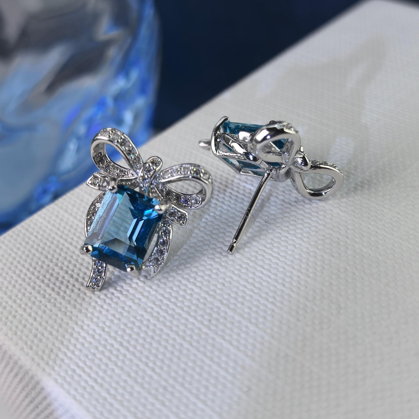 Elegant Rhodium Plated 925 Silver Jewelry Natural London Blue Topaz Bow Stud Earrings
