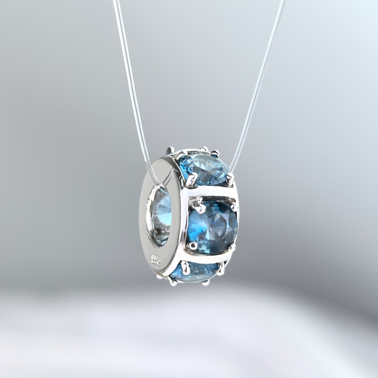 Delicate Rhodium Plated 925 Sterling Silver London Blue Topaz Pendant