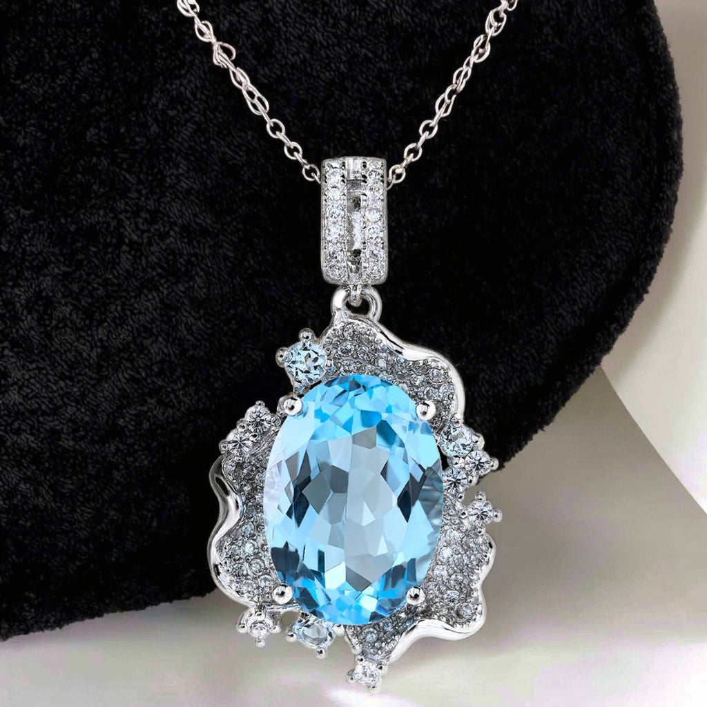 Graceful 925 Sterling Silver Pendant Rhodium Plated with Natural Sky Blue Topaz