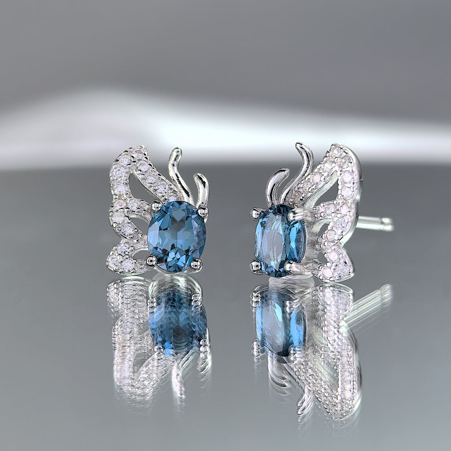 Graceful Rhodium Plated 925 Silver Natural London Blue Topaz Butterfly Stud Earrings