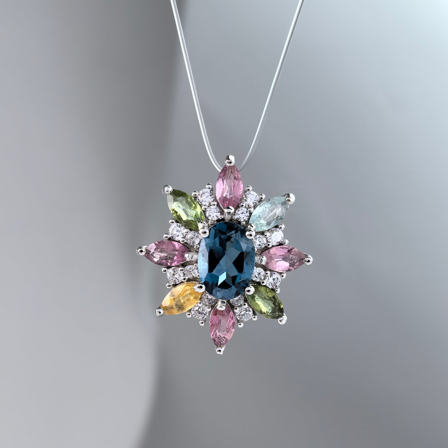 Elegant Rhodium Plated Silver 925 Natural London Blue Topaz Flower Pendant