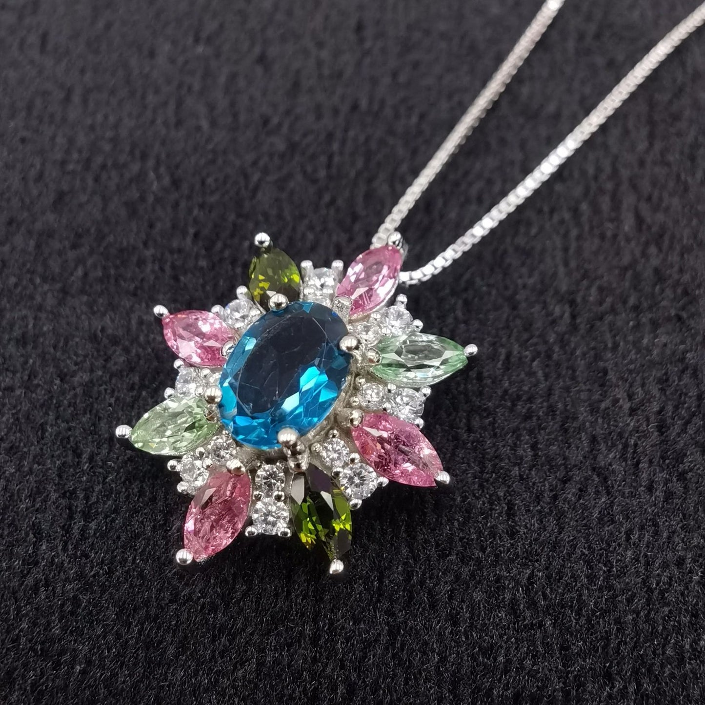Elegant Rhodium Plated Silver 925 Natural London Blue Topaz Flower Pendant