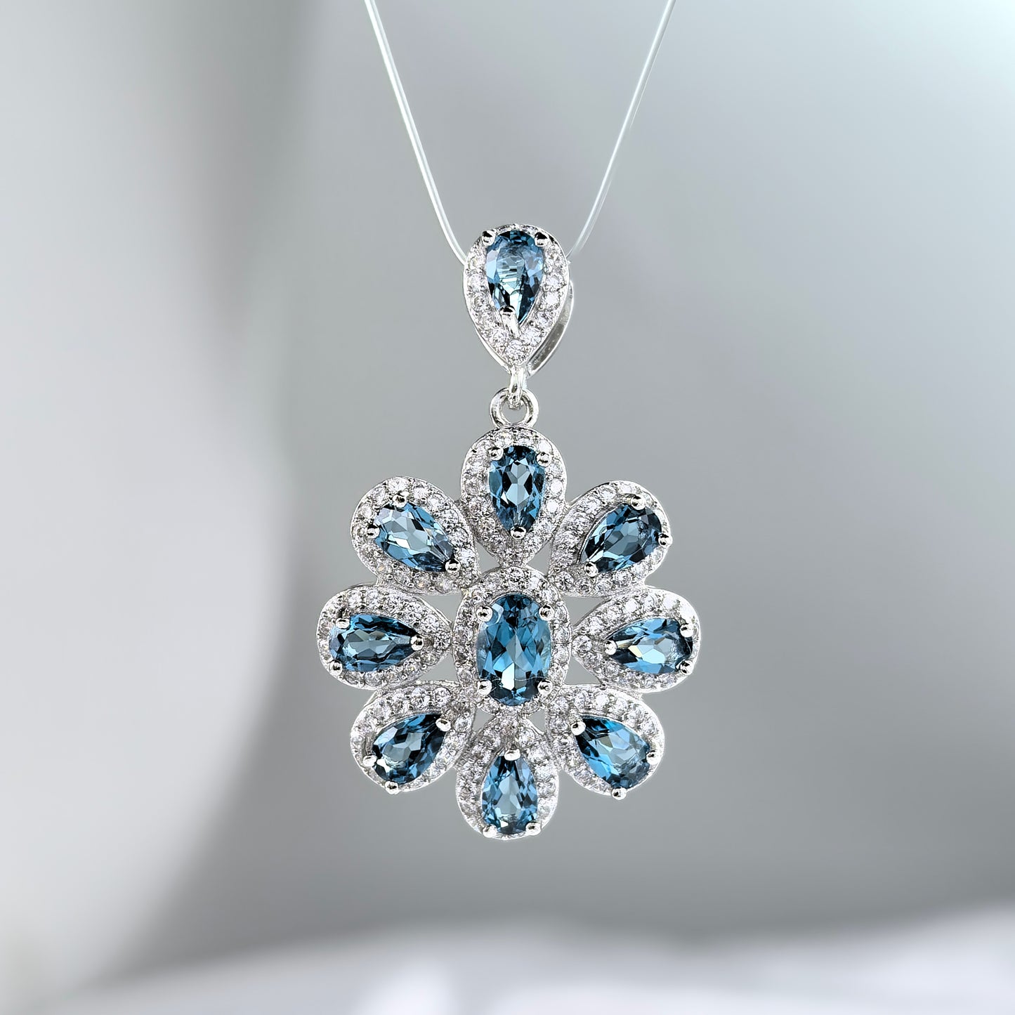 Sparkling Rhodium Plated 925 Sterling Silver Natural London Blue Topaz Pendant