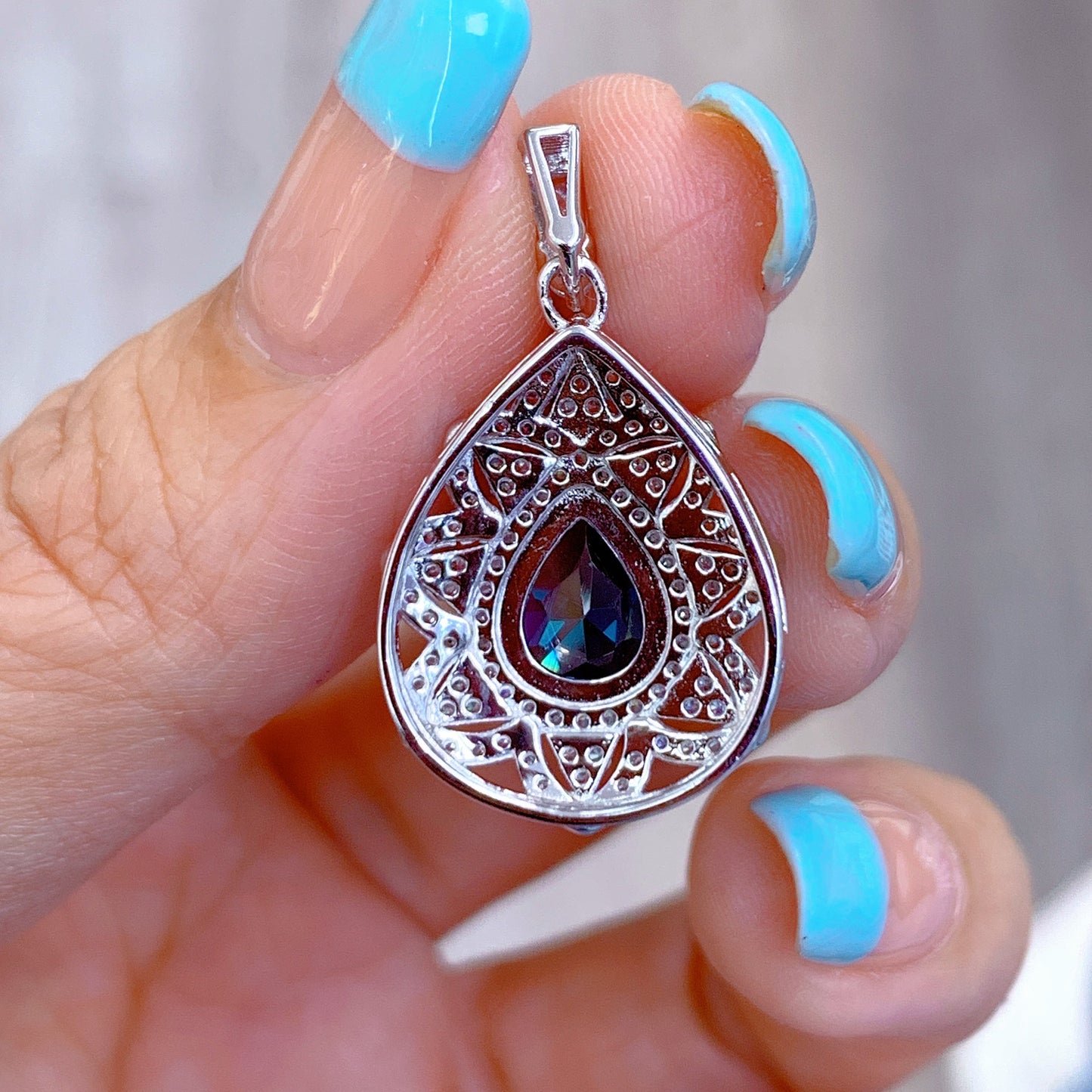Graceful Rhodium Plated 925 Silver Natural London Blue Topaz Pendant