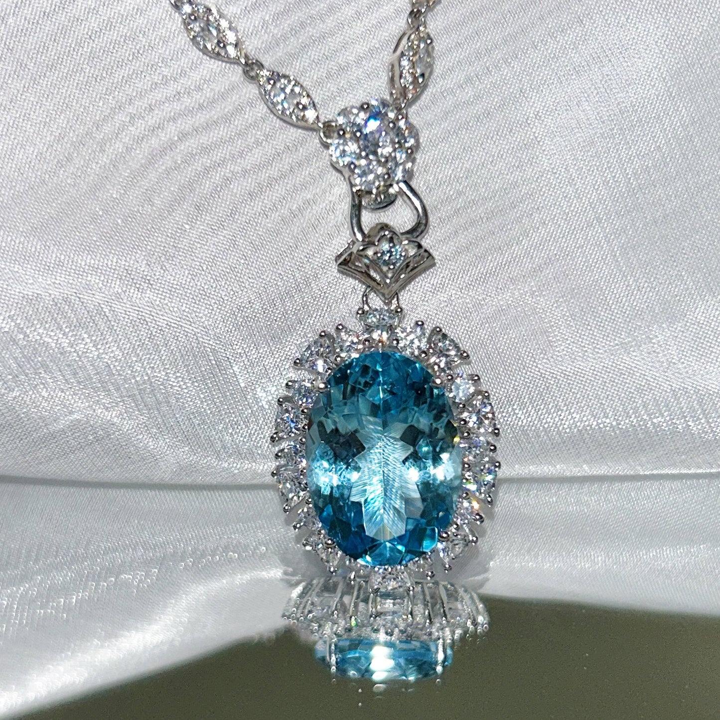 Dazzling Rhodium Plated 925 Sterling Silver for Swiss Blue Topaz Pendant