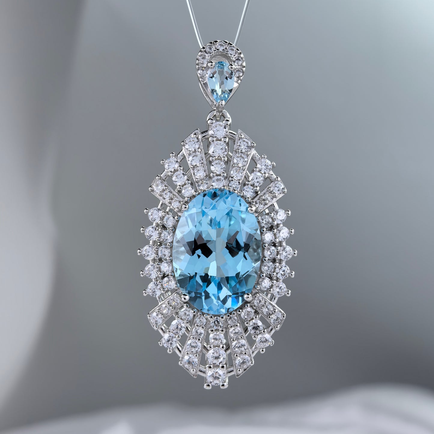 Radiant Rhodium Plated 925 Sterling Silver Natural Sky Blue Topaz Pendant