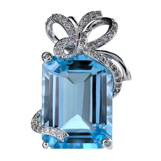 Elegant Rhodium Plated 925 Sterling Silver Natural Sky Blue Topaz Bow Pendant