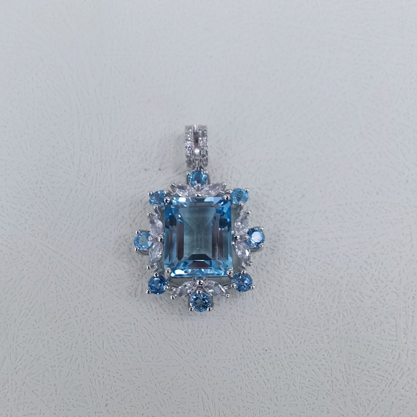 Delicate Rhodium Plated 925 Silver Emerald Cut Natural Sky Blue Topaz Pendant