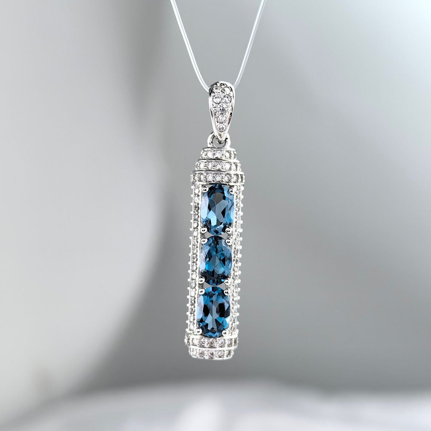 Unique Rhodium Plated 925 Sterling Silver Natural London Blue Topaz Pendant