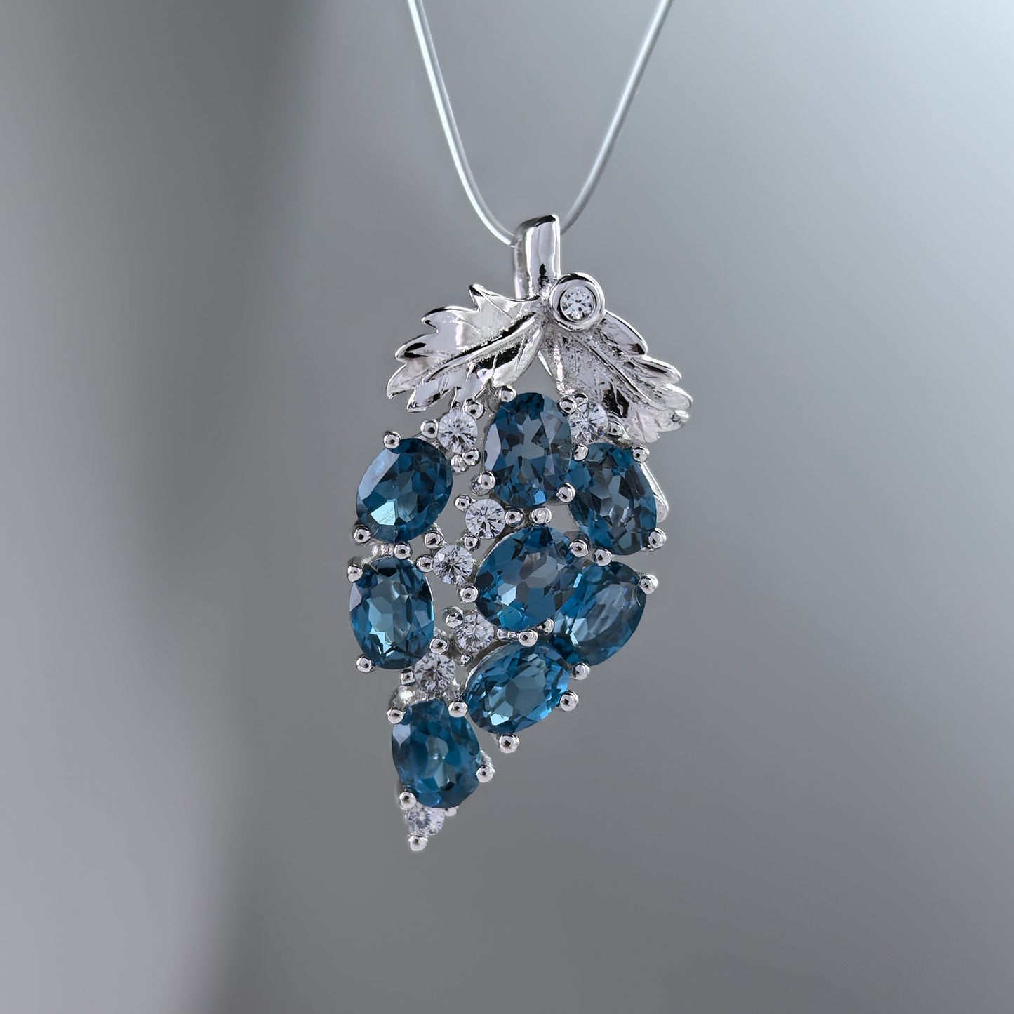 Rhodium Plated 925 Sterling Silver London Blue Topaz Grape Pendant